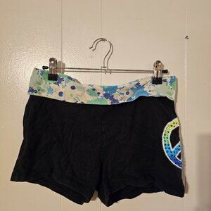 Justice shorts with a sequin peace sign